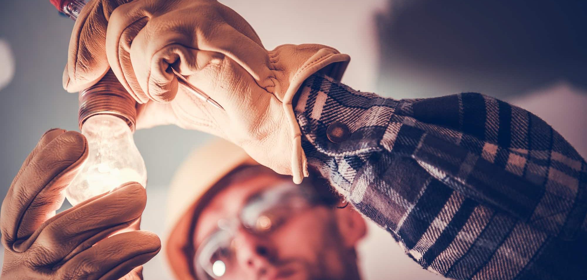 Electrician Fixing the Light