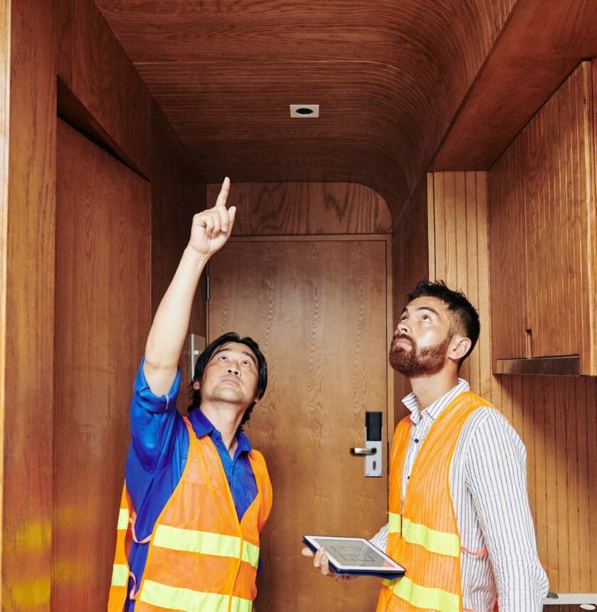 Electrician showing light sockets