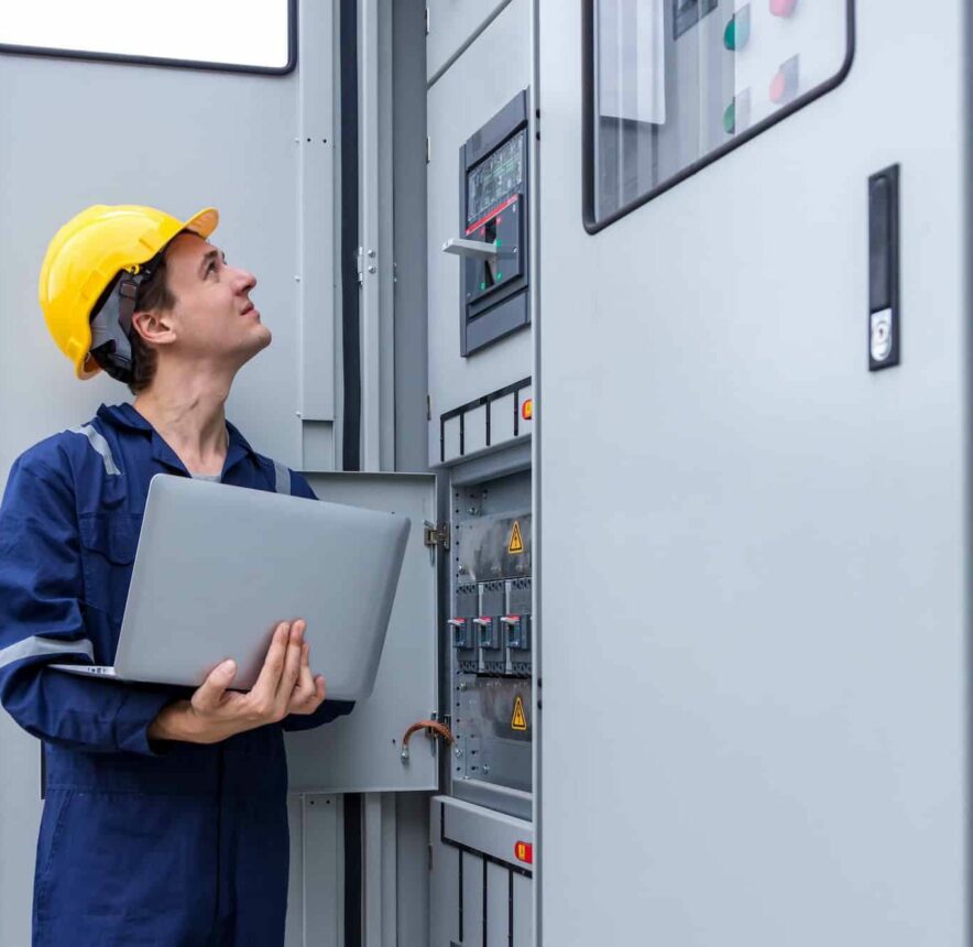 Electrical engineer working in control room.