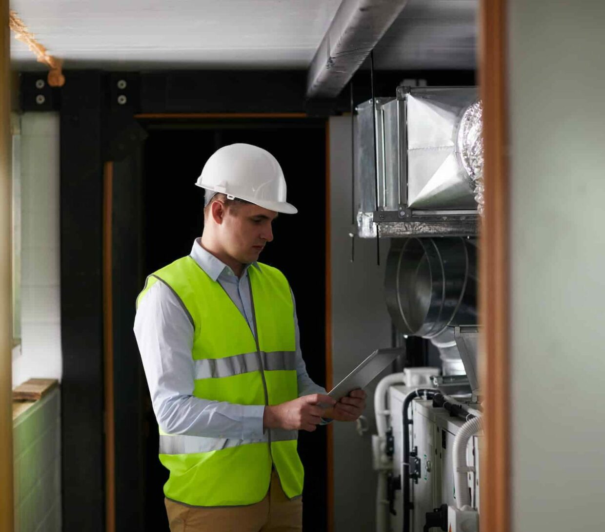 Engineer using tablet pc at work