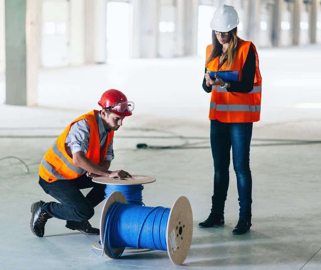 engineers checking cables