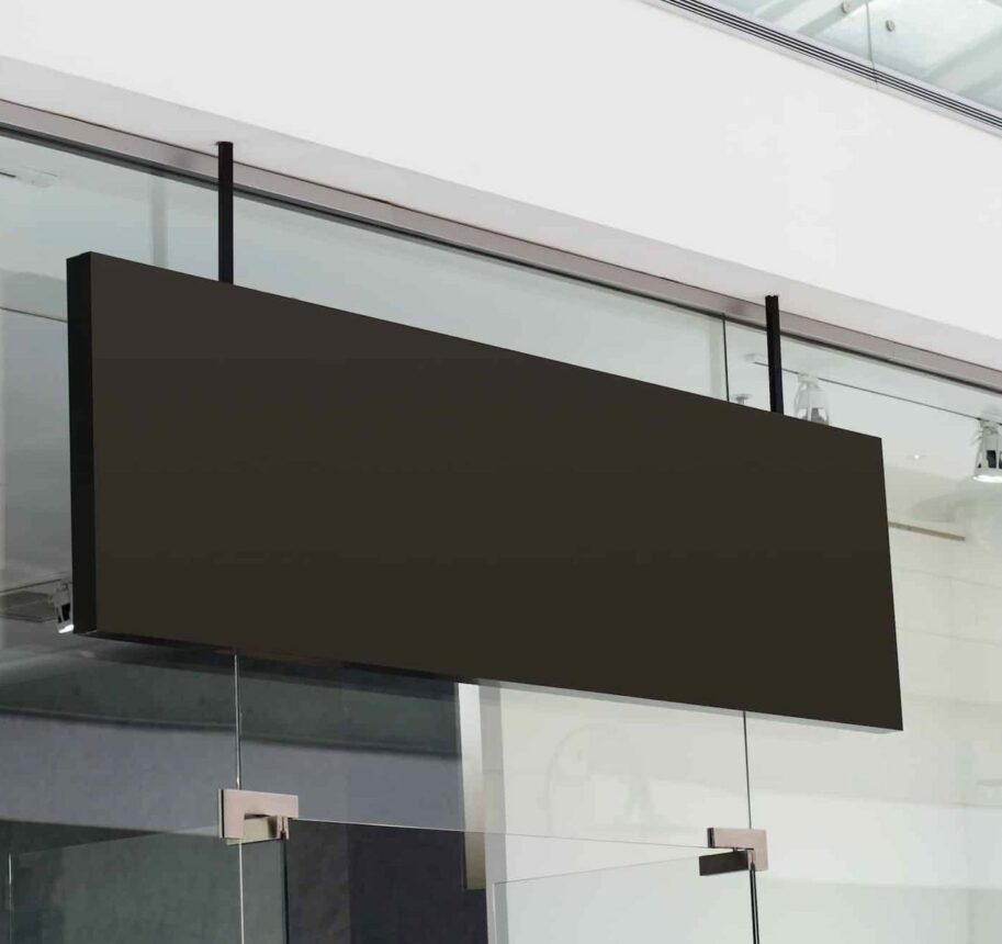 horizontal black signage on shop front