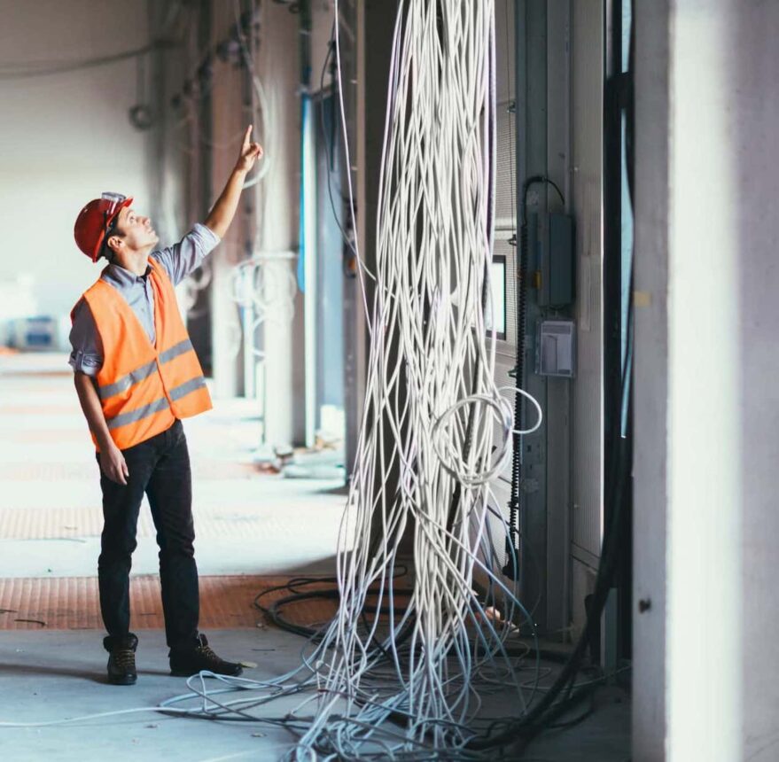 maintenance engineers checking cables cropped