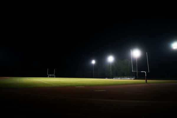 Scenic View Of Illuminated American Football Field At Night